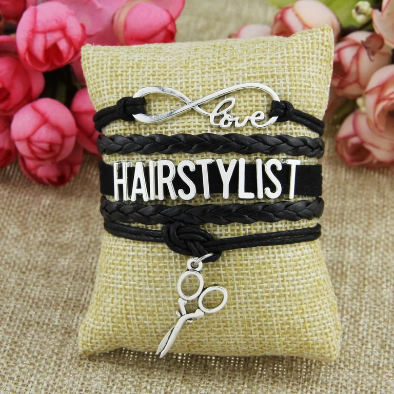 Stiliseret armbånd med frisørværktøjsdesign Dekorativt armbånd med frisørværktøjer