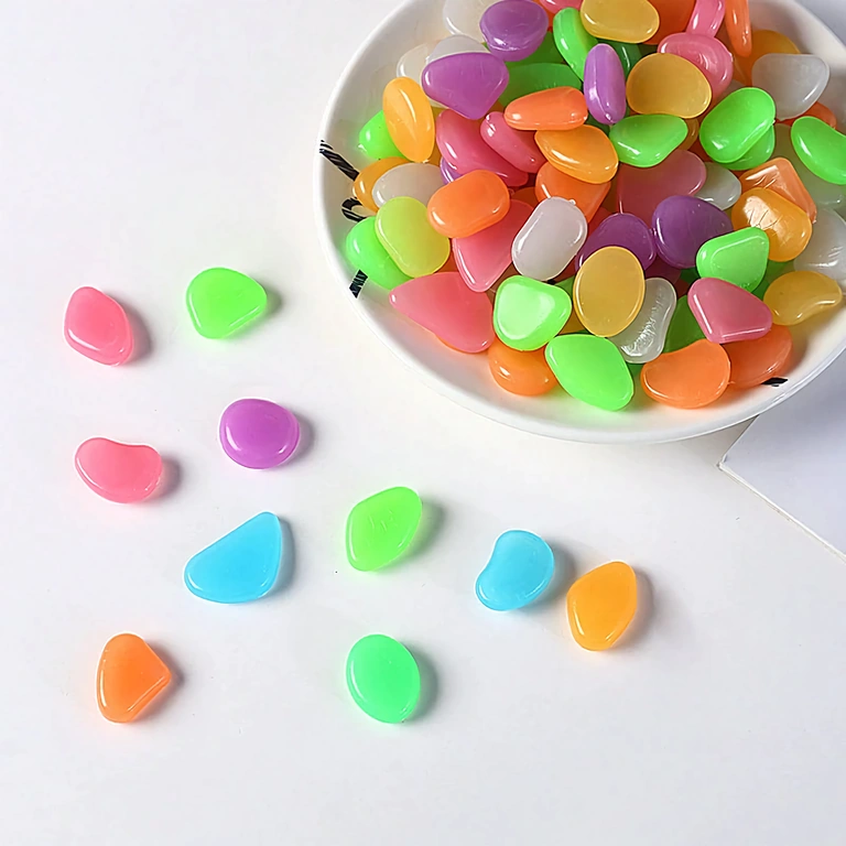 Dekorativ pakke med 100 phosphorescerende sten